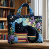 Handgefertigte Stepptasche – Schwarze Katze auf Büchern