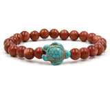 Armbänder mit Natursteinen in Schildkrötenform