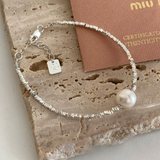 Quadratisches Weißgold-Armband „Liebe“