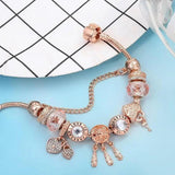 Rosa Traumfänger-Armband mit Weißgold-Anhängern