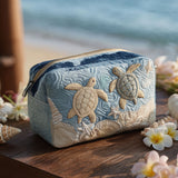 Gesteppte Kosmetiktasche mit zarten Muscheln