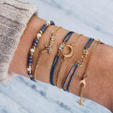 Set aus glitzernden Armbändern