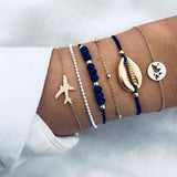 Set aus glitzernden Armbändern