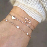 Set aus glitzernden Armbändern