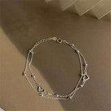 Verstellbares Weißgold-Armband mit Herz