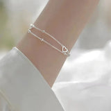 Verstellbares Weißgold-Armband mit Herz